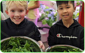 Two Students with Greens 