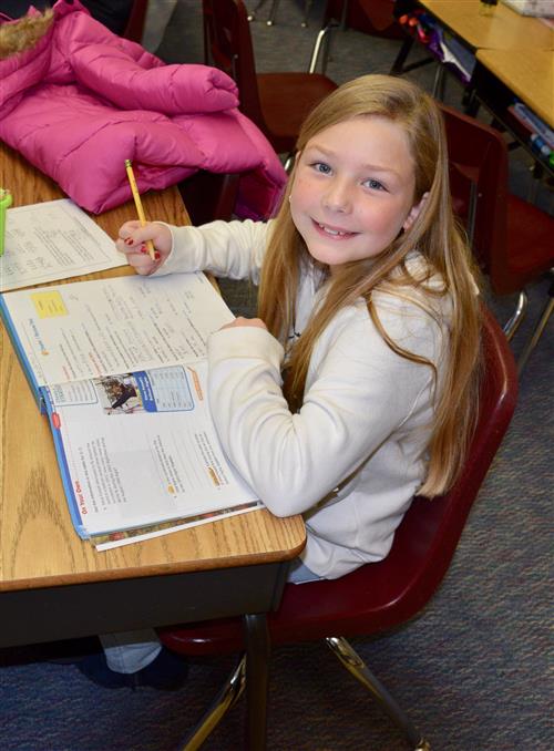 Student with textbook 