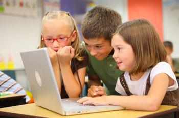 Students at a laptop 
