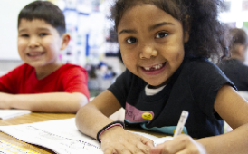  Two Smiling students in class