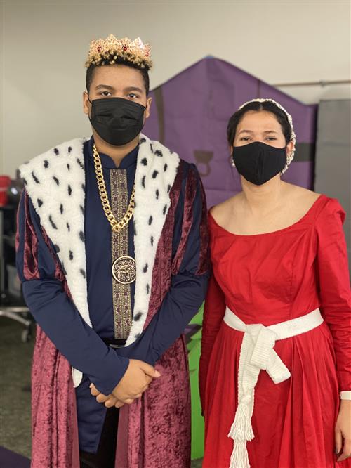 student and teacher in costume at Renaissance Fair