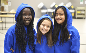  picture of 3 students smiling