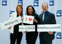  administrators holding ASD signs
