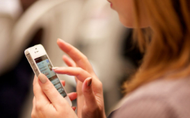  finger tapping a smart phone