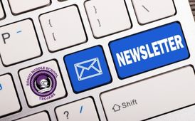  keyboard with a key that says "newsletter"