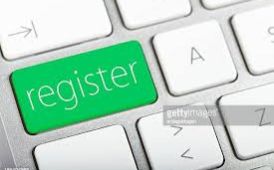 a keyboard with a Green Registration Key 