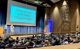  an audience and people on stage
